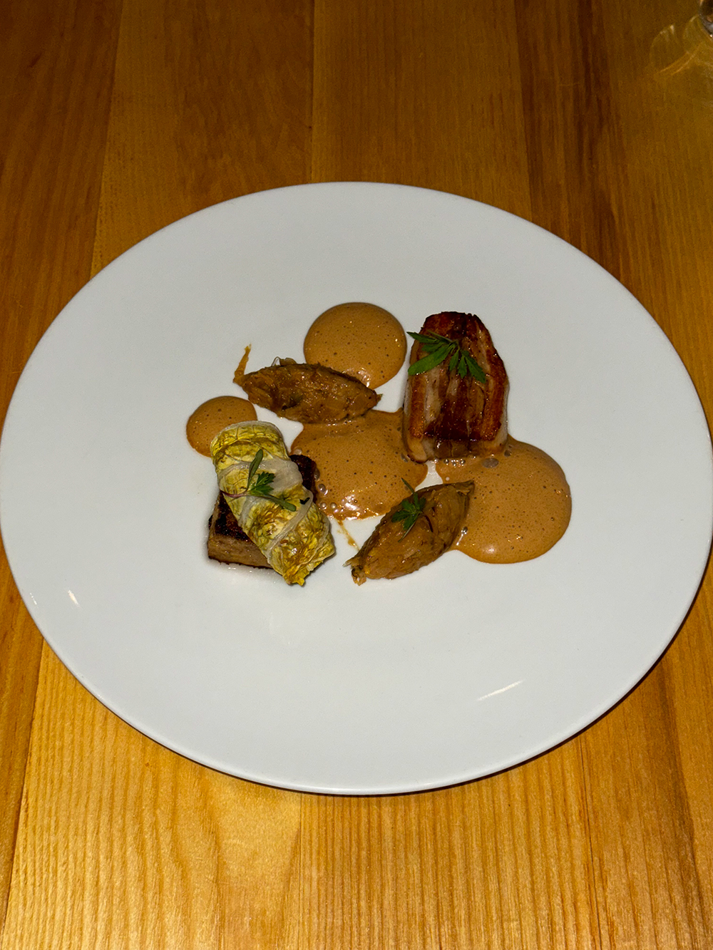 Trio of Fraser Valley Suckling Pork (carmelized napa cabbage, black garlic) from The Ugly Duckling, Victoria, British Columbia Canada