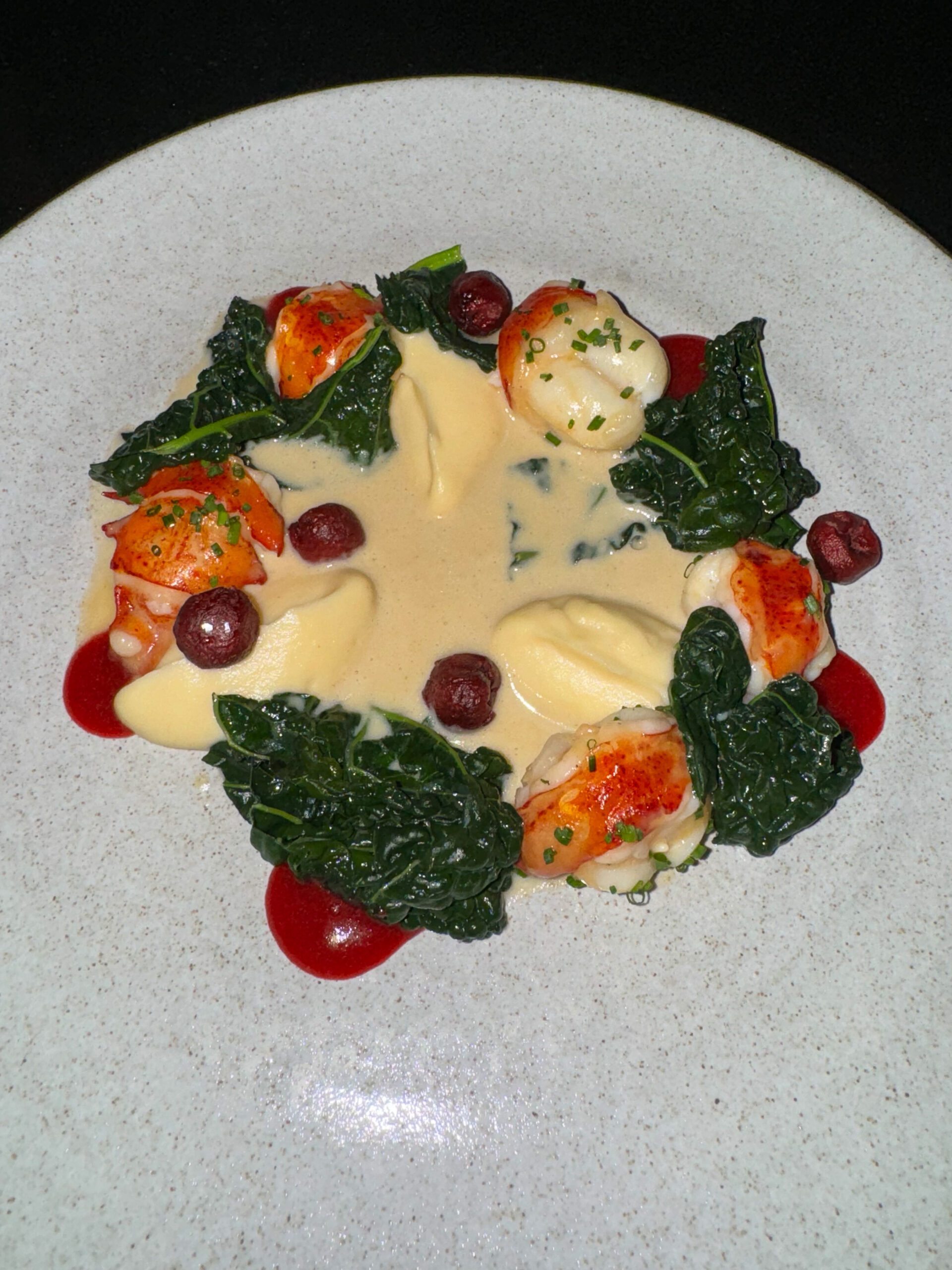 WARM LOBSTER TAIL (celeriac, sour cherry, champagne veloute, kale) from Q at the Fairmont Empress