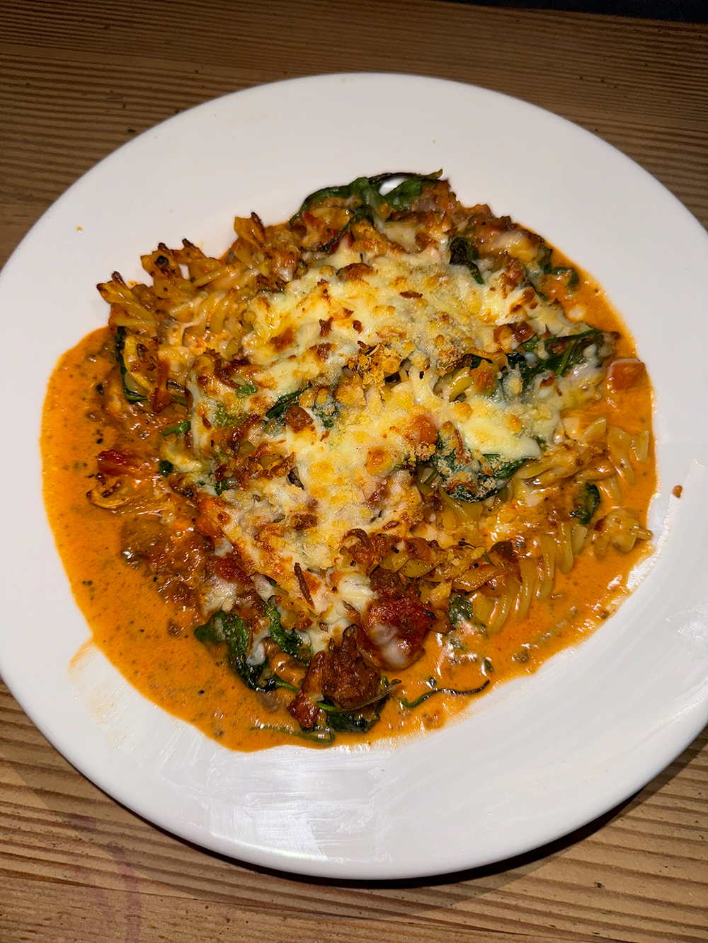 FUSILLI con SUGO di MANZO (Fusilli pasta in a slow-cooked Bolognese meat sauce, baked with mozzarella, spinach and fresh basil) at the Il Terrazzo Ristorante, Victoria, BC Canada